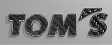 TOMS emblem carbon